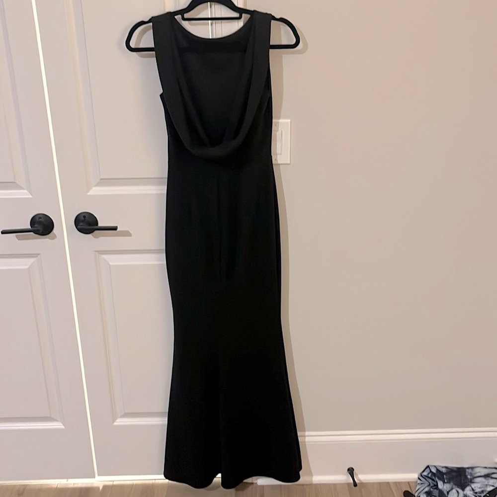 Katie May long evening gown with scoop back.